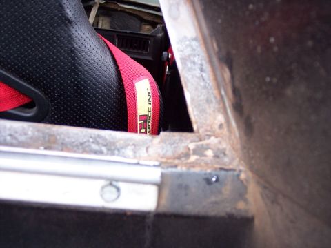1972 Ford Ranchero - Interior view of a racing seat with a red harness, showing "P2 CHOICE INC" text.