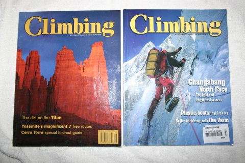 2003 Jeep TJ - Two issues of Climbing magazine are displayed, different outdoor adventure themes.