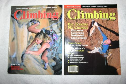 2003 Jeep TJ - Two issues of Climbing magazine are displayed side-by-side, rock climbing photography and articles.