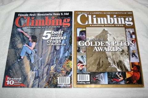 2003 Jeep TJ - Two issues of Climbing magazine are displayed, one from February 2003 and the other from March 2002.