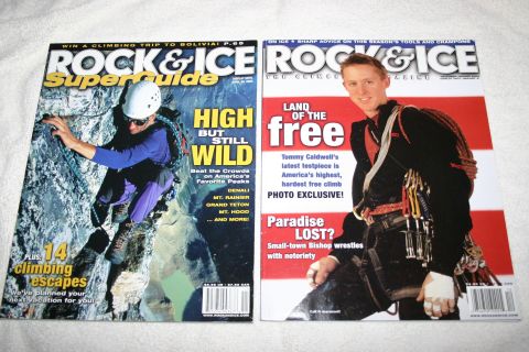 2003 Jeep TJ - Two issues of Rock & Ice magazine are displayed, climbing-related content on their covers.
