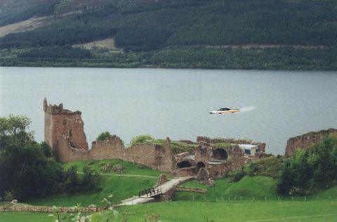 1971 Ford Ranchero - A 1971 Ford Ranchero appears to fly over the waters of Loch Ness, with Urquhart Castle ruins in the foreground.