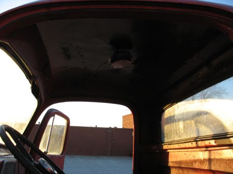1952 Ford Pickup - Interior view of a 1952 Ford Pickup, focusing on the cab and dashboard area.