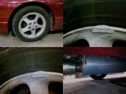 1993 Ford Probe - Close-up views of a red car's wheel, tire, and exhaust system, confirming it is a 1993 Ford Probe.