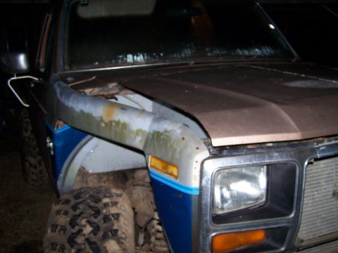 1981 Ford Bronco - This 1981 Ford Bronco features a snorkel and aggressive off-road tires, suggesting it's ready for challenging terrain.