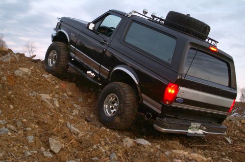 1995 Ford Bronco - This 1995 Ford Bronco is shown climbing a steep, rocky incline.