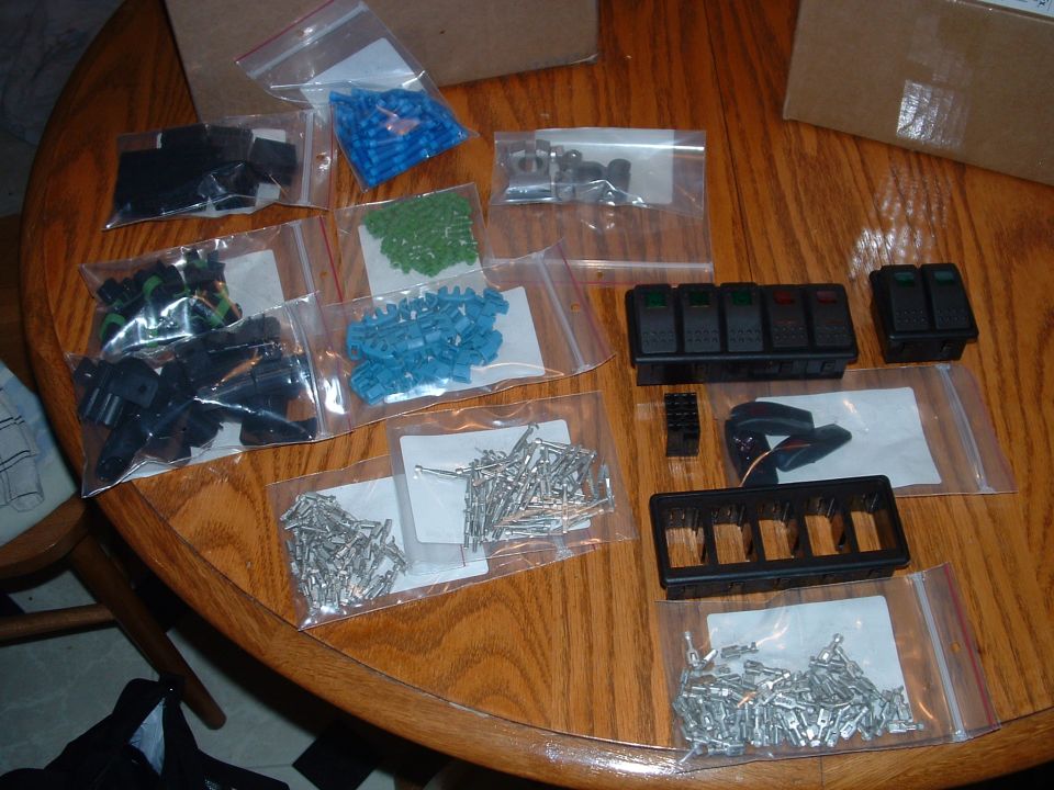 All kinds of stuff... contura switches and accessories, packard 280 series waterproof plugs and all components, wire loom, etc....