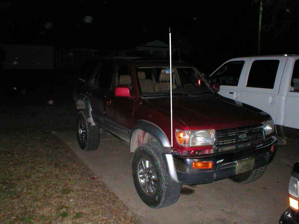 Red 1996 Toyota 4Runner, 3q-front view, with tall antenna