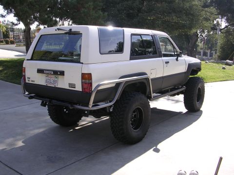 1985 Toyota 4Runner - This modified 1985 Toyota 4Runner features a custom roll cage and oversized tires for off-road use.