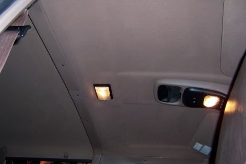 1996 Ford Bronco - The overhead console and dome lights are visible in this interior shot.