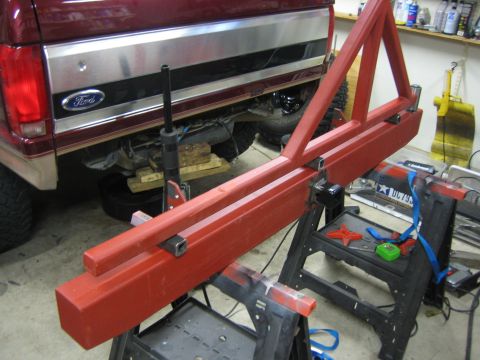 1996 Ford Bronco - Custom metal fabrication project in progress next to a Ford truck's rear end.