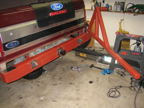 1996 Ford Bronco - The rear bumper of a 1996 Ford Bronco, a Ford Racing decal and a custom red frame attachment.