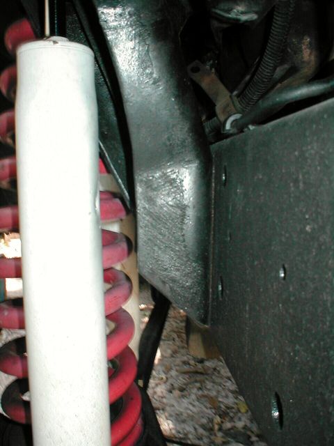 1979 Ford Bronco - well here is the pointy bracket and the little dent in the tube