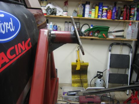1996 Ford Bronco - Close-up of a custom-fabricated metal part with a Ford Racing logo visible on an adjacent surface.