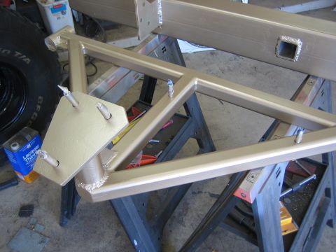 1996 Ford Bronco - A custom-fabricated metal frame, likely for a vehicle's rear bumper, is shown on sawhorses.