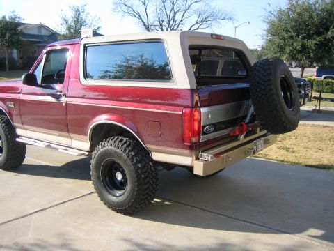 1996 Ford Bronco - This 1996 Ford Bronco features a custom rear bumper with a mounted spare tire.