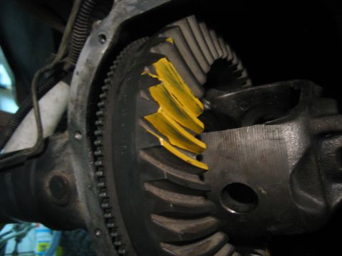 1996 Ford Bronco - Differential gears with yellow paint applied to teeth for inspection.