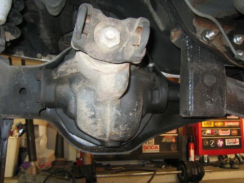 1996 Ford Bronco - The photo shows a close-up view of a vehicle's rear differential and driveshaft, likely during maintenance or modification.