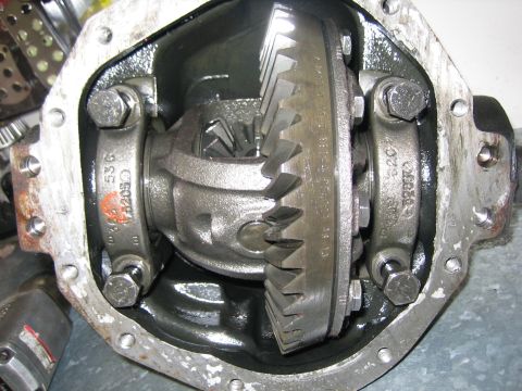 1996 Ford Bronco - Close-up view of a vehicle's differential gear assembly, showing internal components and bolted housing.