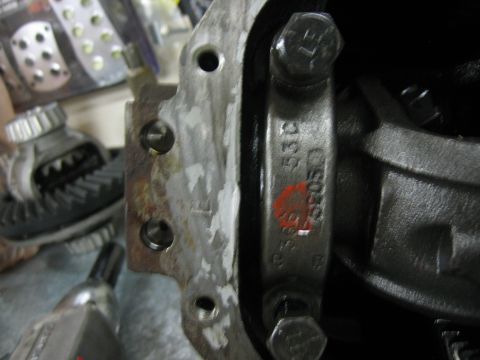 1996 Ford Bronco - Detail of a differential gear assembly, showing internal components and stamped identification numbers.