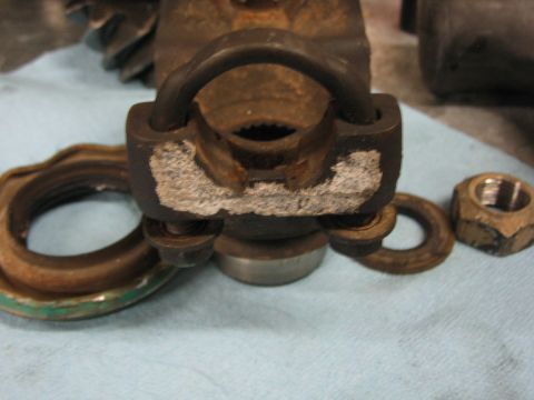 1996 Ford Bronco - Close-up of a differential pinion yoke and bearing assembly with associated hardware.