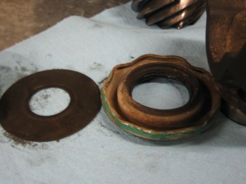 1996 Ford Bronco - Differential gear and seal removed for inspection or replacement.