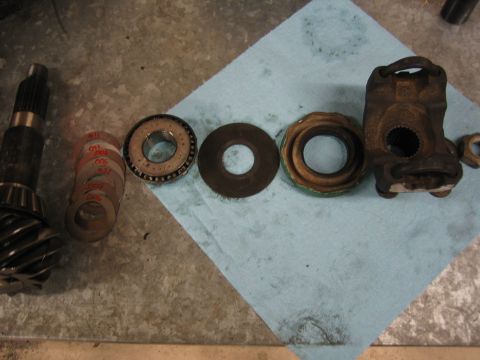 1996 Ford Bronco - Differential components laid out on a blue shop towel.