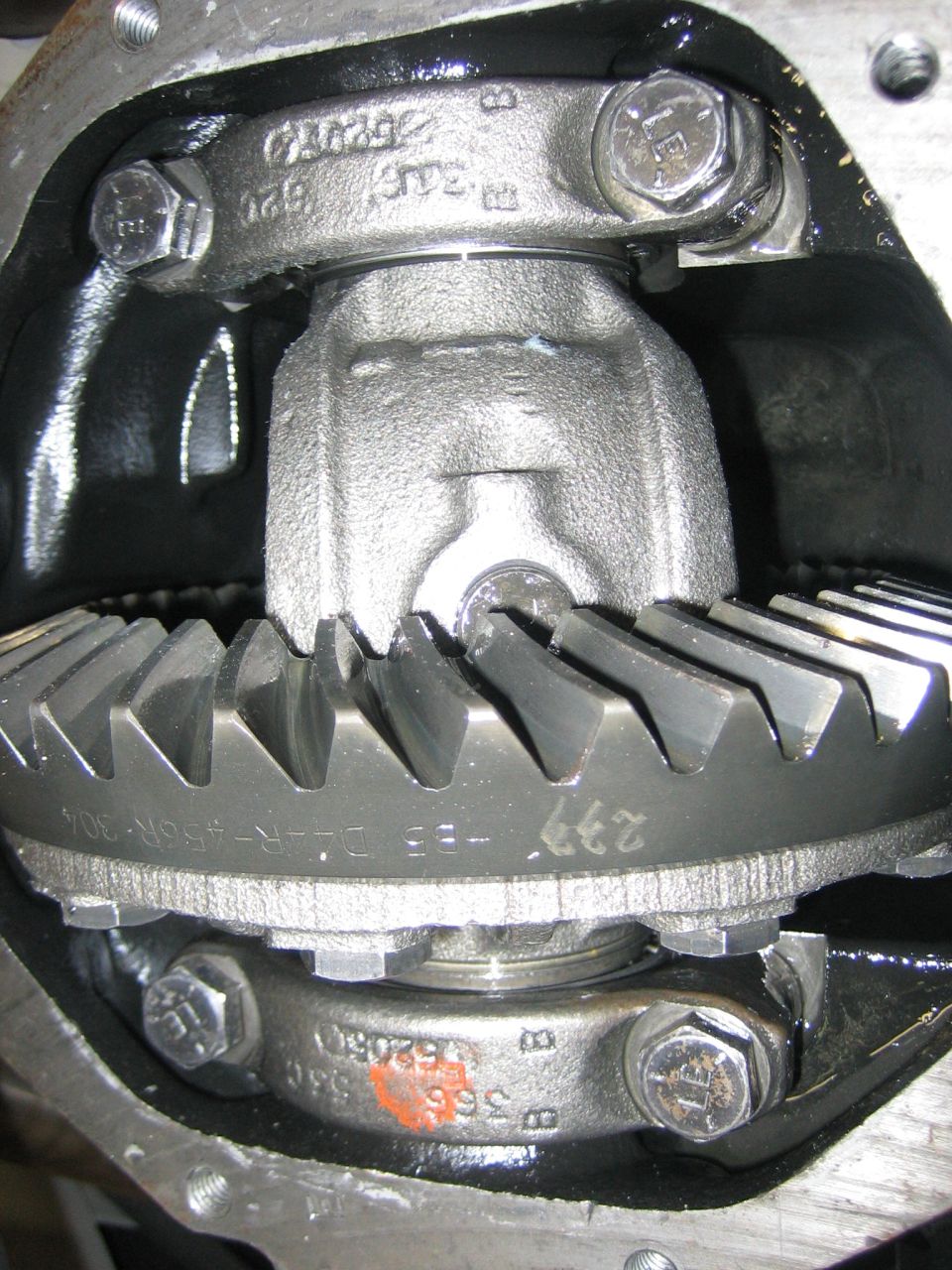 Close-up of differential gears with part numbers visible