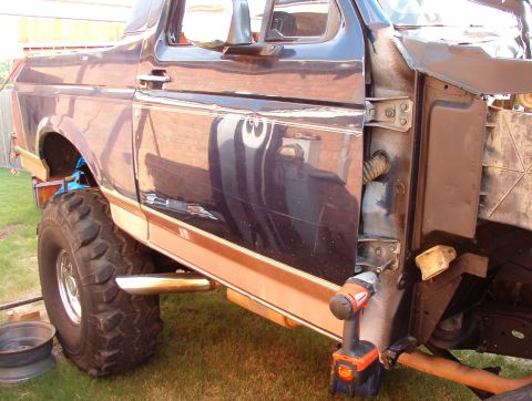 1983 Ford Bronco - It's possible to access the hinge bolts by merely swinging the back edge of the fender away from the body, but it's only a little more work…
