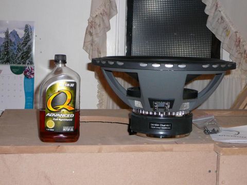 1997 Mercury Grand Marquis - 15 Inch Subwoofer compared to a Quart of Oil.