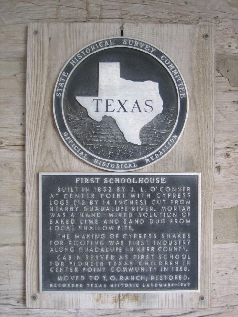 1996 Ford Bronco - A historical marker details the construction and history of the first schoolhouse in Center Point, Texas.