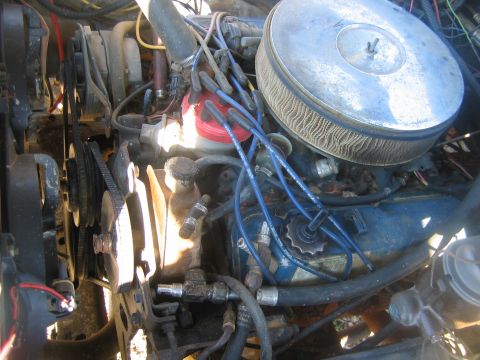 1992 Ford Mustang - Close-up view of an engine bay, showing various components and wiring.