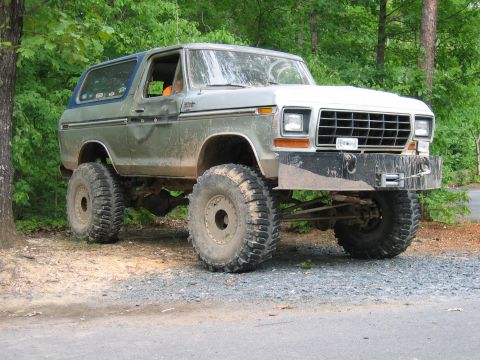 1992 Ford Mustang - This heavily modified 1978 Ford Bronco features oversized off-road tires and a robust front bumper, suggesting it's built for terrain.