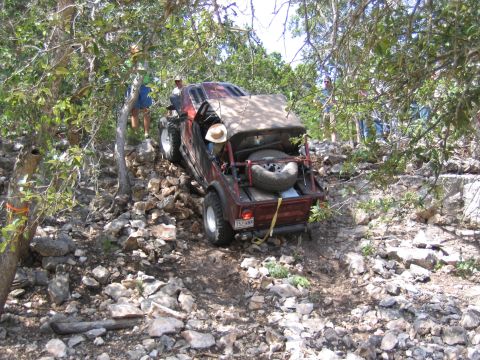 1996 Ford Bronco - This off-road vehicle navigates a challenging rocky path, its capabilities.