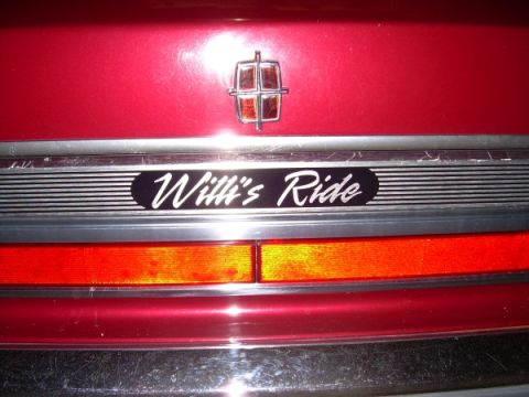 1989 Lincoln Town Car - Rear view of a 1989 Lincoln Town Car, a custom 'Willi's Ride' decal.