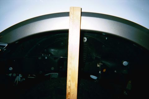 2002 Ford Excursion - its hard to read, but that is a 48" stick and it reads 45.5" at the wheel well