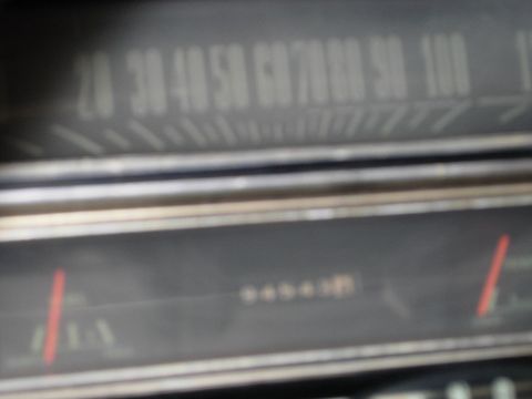 1970 Ford Ranchero - Interior view of a car's dashboard gauges, including the speedometer and odometer.