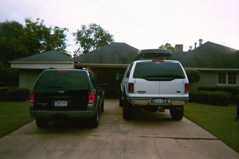 2002 Ford Excursion - size does make a difference. next to a stock explorer 2X