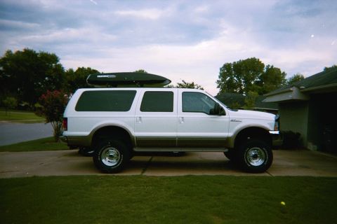 2002 Ford Excursion - this is a 4" pro comp lift with 3.5" rear blocks. truck is 8'11" to top of box