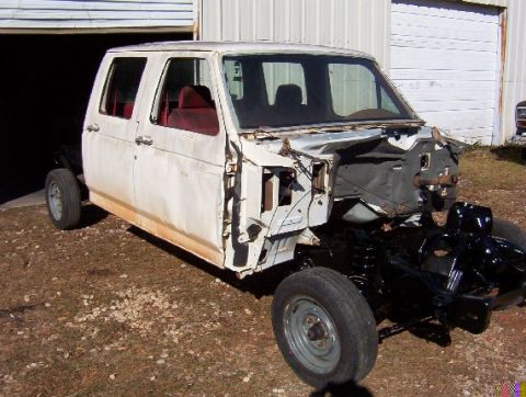 1992 Lincoln Custom - This white crew cab truck chassis is missing its front end and appears to be undergoing a build or restoration.