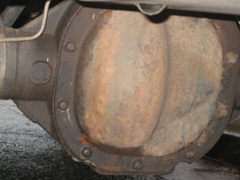 1995 Ford Bronco - This image shows a close-up view of a vehicle's rear differential housing, which appears to be rusty.