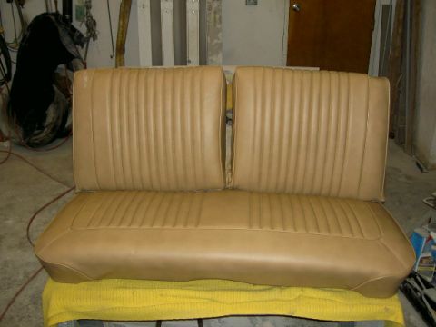 1967 Ford Ranchero - Tan bench seat with vertical pleats, likely for an older vehicle.