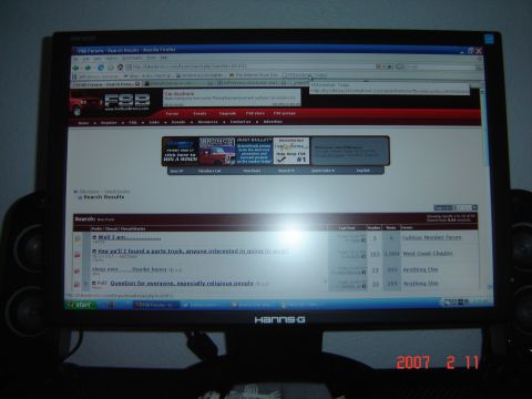1993 Ford Bronco - A computer monitor displays a forum website with an advertisement for a 1993 Ford Bronco.