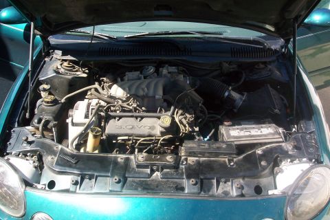 1998 Ford Taurus - engine bay after trying to hide my wires