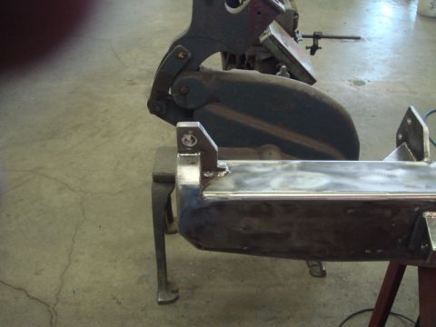 1996 Ford Bronco - A custom metal bumper part is shown, likely undergoing fabrication or repair, with visible welds and mounting points.
