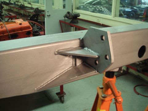1996 Ford Bronco - Close-up of a metal frame section, showing welded brackets and mounting points.