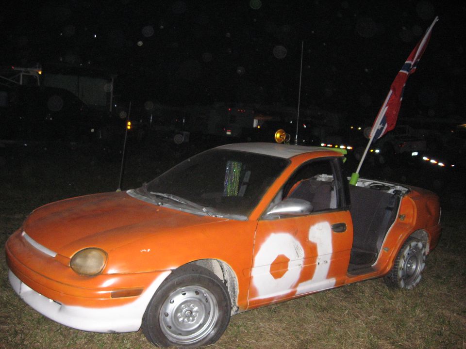 Orange car with white '01' and confederate flag
