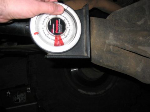 1995 Ford Bronco - A Craftsman Magnetic Professional Protractor is used to measure the angle of a vehicle's differential housing.