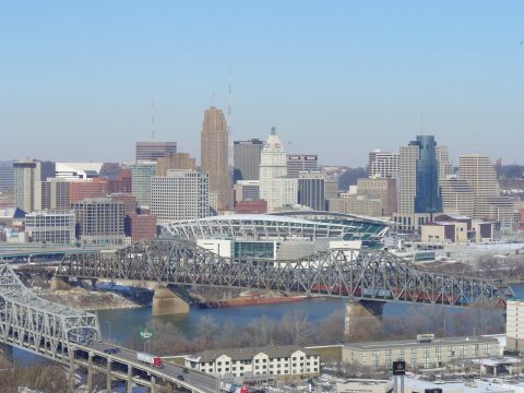 1991 Ford Probe - A wide view of the Cincinnati skyline, bridges crossing the Ohio River and various downtown buildings.