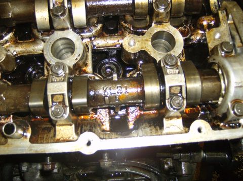 1996 Ford Probe - The image shows a close-up view of an engine's camshaft, revealing internal mechanical components.
